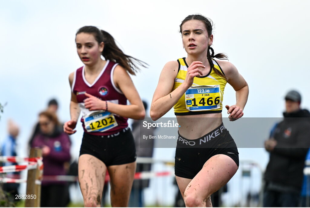 19 November 2023; Lucy O'flynn of Bandon AC, Cork, right, and Ailbhe O'farrell of Mullingar Harriers AC, Westmeath, competing in the Womens U18 & Junior 5000m during the 123.ie National Senior & Even Age Cross Country Championships at Gowran Demesne in Kilkenny. Photo by Ben McShane/Sportsfile