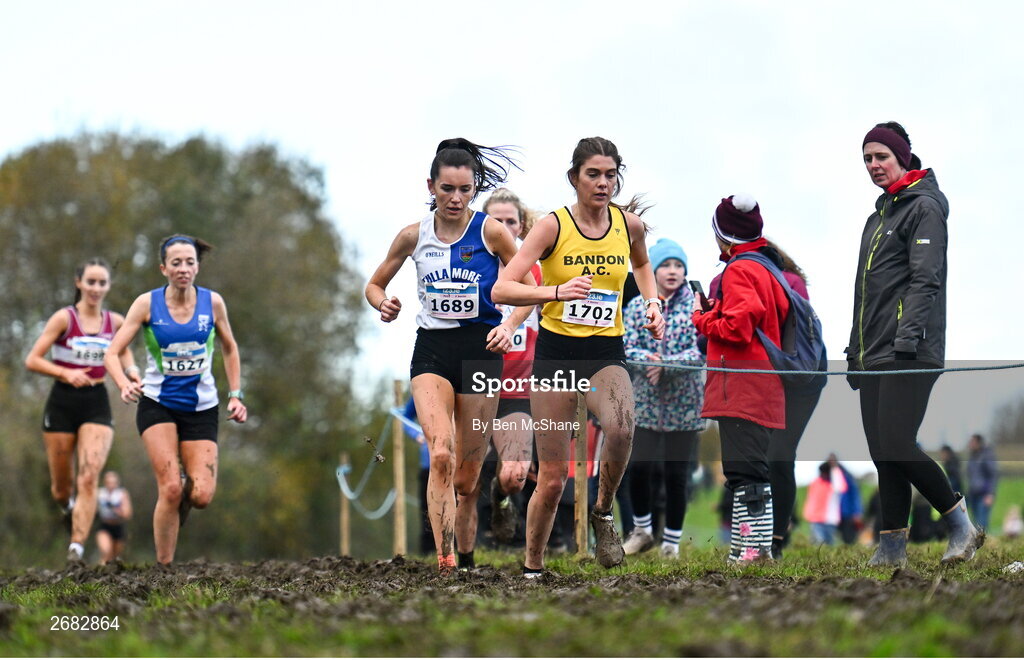 19 November 2023; Fiona Everard of Bandon AC, Cork, right, and Danielle Donegan of Tullamore Harriers AC, Offaly, competing in the Womens Senior 9000m during the 123.ie National Senior & Even Age Cross Country Championships at Gowran Demesne in Kilkenny. Photo by Ben McShane/Sportsfile