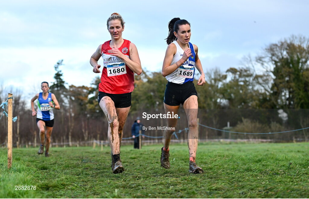 19 November 2023; Mary Mulhare of Portlaoise AC, Laois, left, and Danielle Donegan of Tullamore Harriers AC, Offaly, competing in the Womens Senior 9000m during the 123.ie National Senior & Even Age Cross Country Championships at Gowran Demesne in Kilkenny. Photo by Ben McShane/Sportsfile