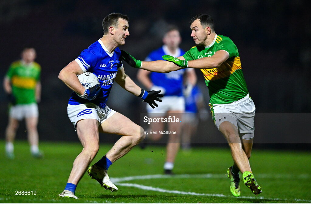 25 November 2023; Leo McLoone of Naomh Conaill in action against Michael Warnock of Glen during the AIB Ulster GAA Football Senior Club Championship semi-final match between Glen, Derry, and Naomh Conaill, Donegal, at Healy Park in Omagh, Tyrone. Photo by Ben McShane/Sportsfile