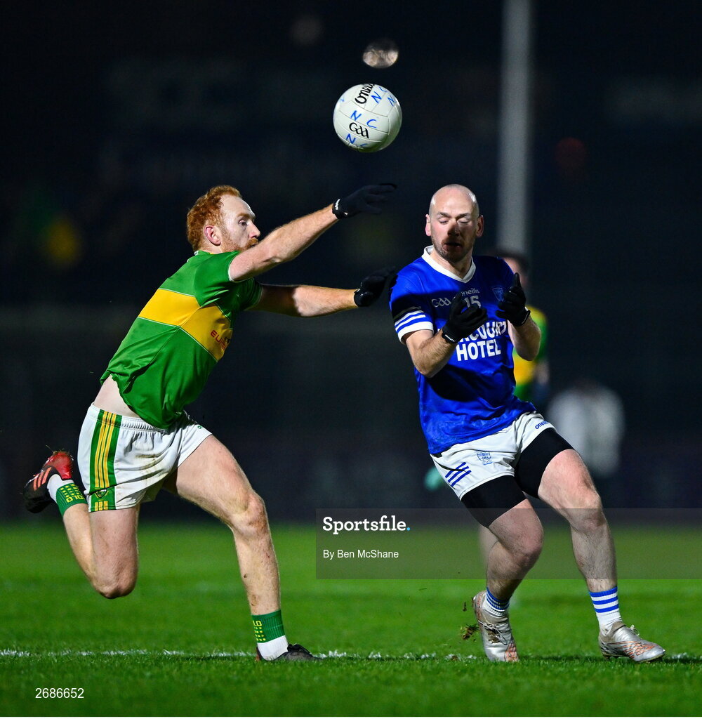 25 November 2023; John O'Malley of Naomh Conaill in action against Conor Glass of Glen during the AIB Ulster GAA Football Senior Club Championship semi-final match between Glen, Derry, and Naomh Conaill, Donegal, at Healy Park in Omagh, Tyrone. Photo by Ben McShane/Sportsfile