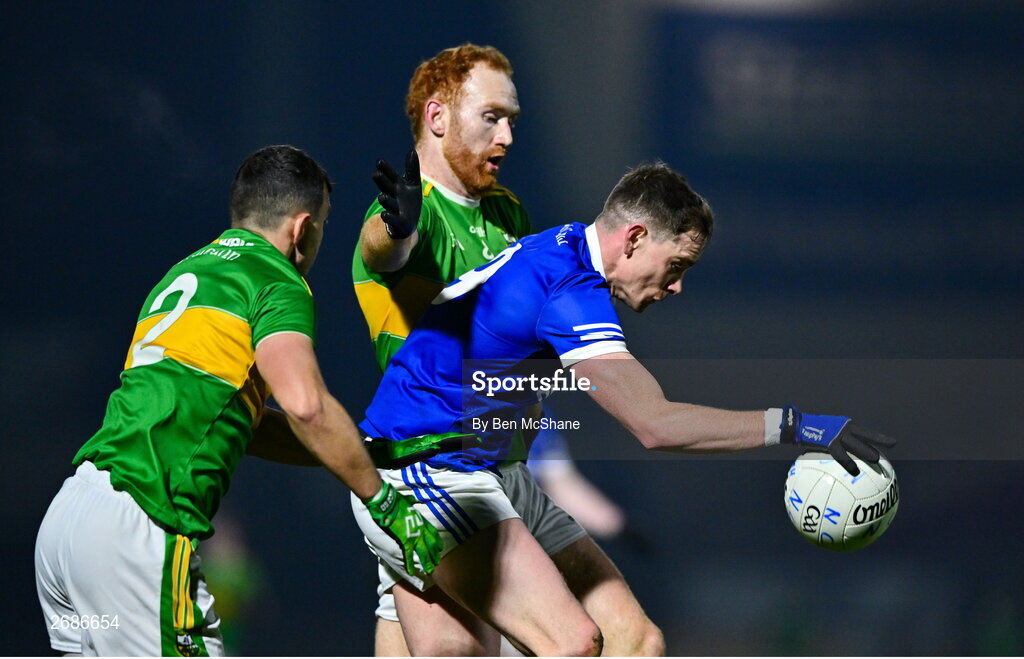25 November 2023; Ciaran Thompson of Naomh Conaill in action against Conor Glass, centre, and Michael Warnock of Glen during the AIB Ulster GAA Football Senior Club Championship semi-final match between Glen, Derry, and Naomh Conaill, Donegal, at Healy Park in Omagh, Tyrone. Photo by Ben McShane/Sportsfile