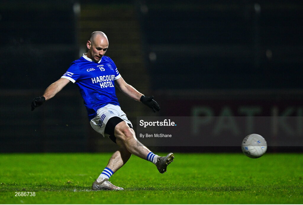 25 November 2023; John O'Malley of Naomh Conaill scores his side's first goal, a penalty, during the AIB Ulster GAA Football Senior Club Championship semi-final match between Glen, Derry, and Naomh Conaill, Donegal, at Healy Park in Omagh, Tyrone. Photo by Ben McShane/Sportsfile