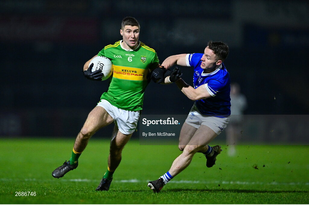 25 November 2023; Ciaran McFaul of Glen in action against Eunan Doherty of Naomh Conaill during the AIB Ulster GAA Football Senior Club Championship semi-final match between Glen, Derry, and Naomh Conaill, Donegal, at Healy Park in Omagh, Tyrone. Photo by Ben McShane/Sportsfile