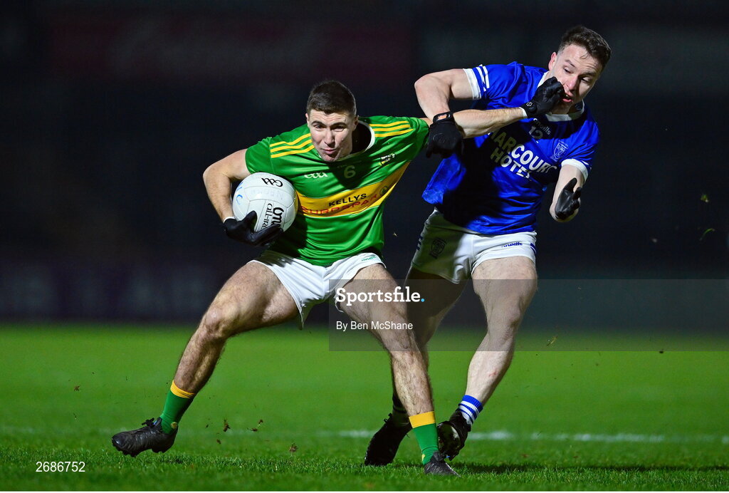 25 November 2023; Ciaran McFaul of Glen in action against Eunan Doherty of Naomh Conaill during the AIB Ulster GAA Football Senior Club Championship semi-final match between Glen, Derry, and Naomh Conaill, Donegal, at Healy Park in Omagh, Tyrone. Photo by Ben McShane/Sportsfile
