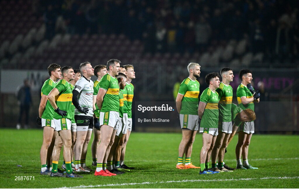 25 November 2023; Glen players stand for Amhrán na bhFiann before the AIB Ulster GAA Football Senior Club Championship semi-final match between Glen, Derry, and Naomh Conaill, Donegal, at Healy Park in Omagh, Tyrone. Photo by Ben McShane/Sportsfile