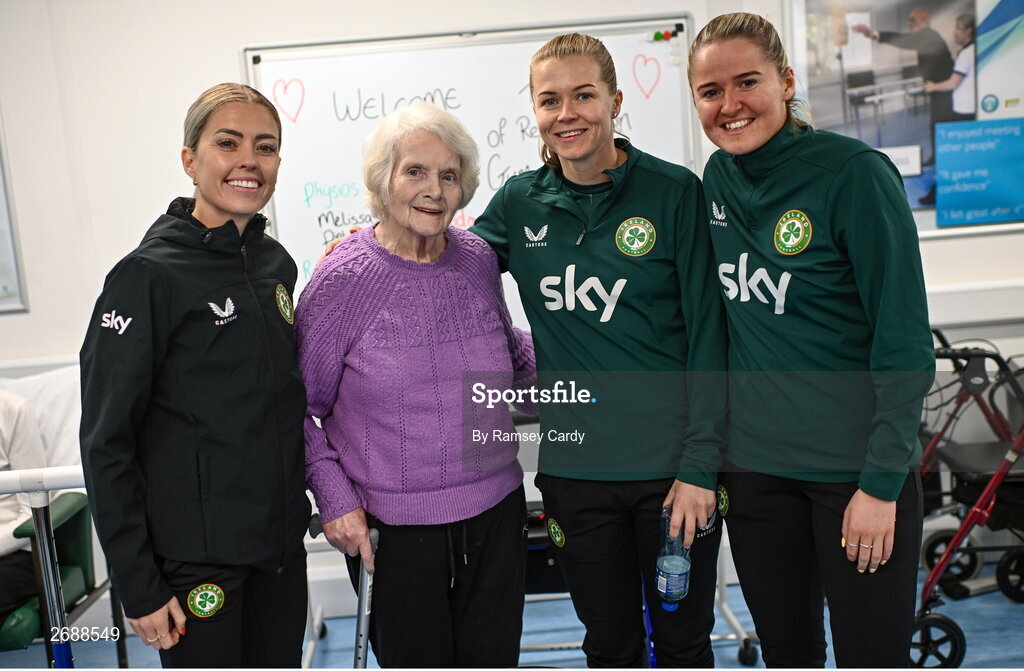 27 Novmeber 2023; Republic of Ireland players, from left, Denise O'Sullivan, Ruesha Littlejohn and Erin McLaughlin with Lily Murtagh during a visit to Cappagh Kids and The National Orthopaedic Hospital Cappagh in Dublin to launch the Cappagh Hospital Foundation Christmas Appeal and their fundraising ambassador Boney Maloney. Photo by Ramsey Cardy/Sportsfile