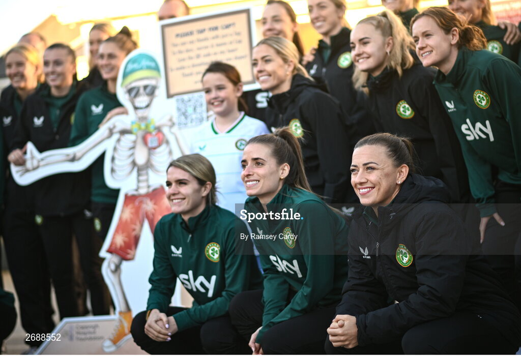 27 Novmeber 2023; Republic of Ireland players, front row, from left, Jamie Finn, Chloe Mustaki, and Katie McCabe during a visit to Cappagh Kids and The National Orthopaedic Hospital Cappagh in Dublin to launch the Cappagh Hospital Foundation Christmas Appeal and their fundraising ambassador Boney Maloney. Photo by Ramsey Cardy/Sportsfile
