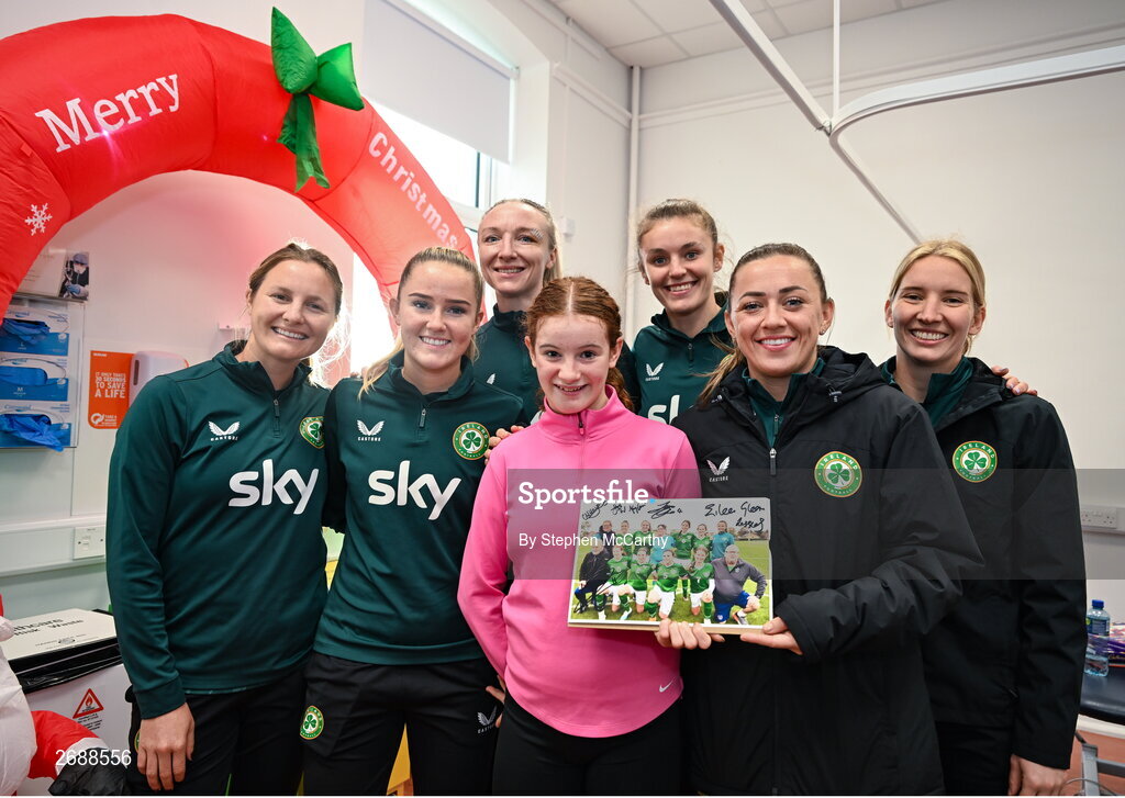 27 Novmeber 2023; Republic of Ireland players, from left, Kyra Carusa, Erin McLaughlin, Louise Quinn, Caitlin Hayes, Katie McCabe and goalkeeper Sophie Whitehouse with Elsie Friel, from Drumkeen, Donegal, a member of the Ireland women's CP team, during a visit to Cappagh Kids and The National Orthopaedic Hospital Cappagh in Dublin to launch the Cappagh Hospital Foundation Christmas Appeal and their fundraising ambassador Boney Maloney. Photo by Stephen McCarthy/Sportsfile