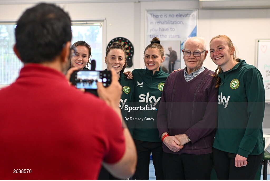 27 Novmeber 2023; Republic of Ireland players, from left, Heather Payne, Lucy Quinn, Sinead Farrelly and Courtney Brosnan with Eddie Neville during a visit to Cappagh Kids and The National Orthopaedic Hospital Cappagh in Dublin to launch the Cappagh Hospital Foundation Christmas Appeal and their fundraising ambassador Boney Maloney. Photo by Ramsey Cardy/Sportsfile