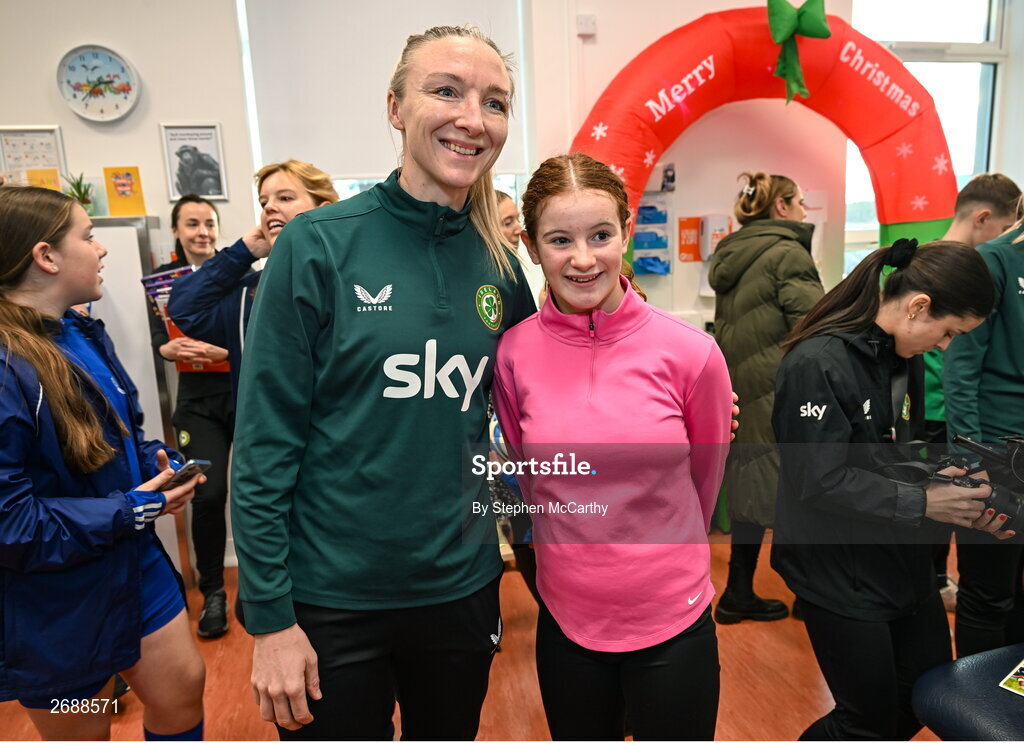 27 Novmeber 2023; Republic of Ireland's Louise Quinn with Elsie Friel, from Drumkeen, Donegal, a member of the Ireland women's CP team, during a visit to Cappagh Kids and The National Orthopaedic Hospital Cappagh in Dublin to launch the Cappagh Hospital Foundation Christmas Appeal and their fundraising ambassador Boney Maloney. Photo by Stephen McCarthy/Sportsfile