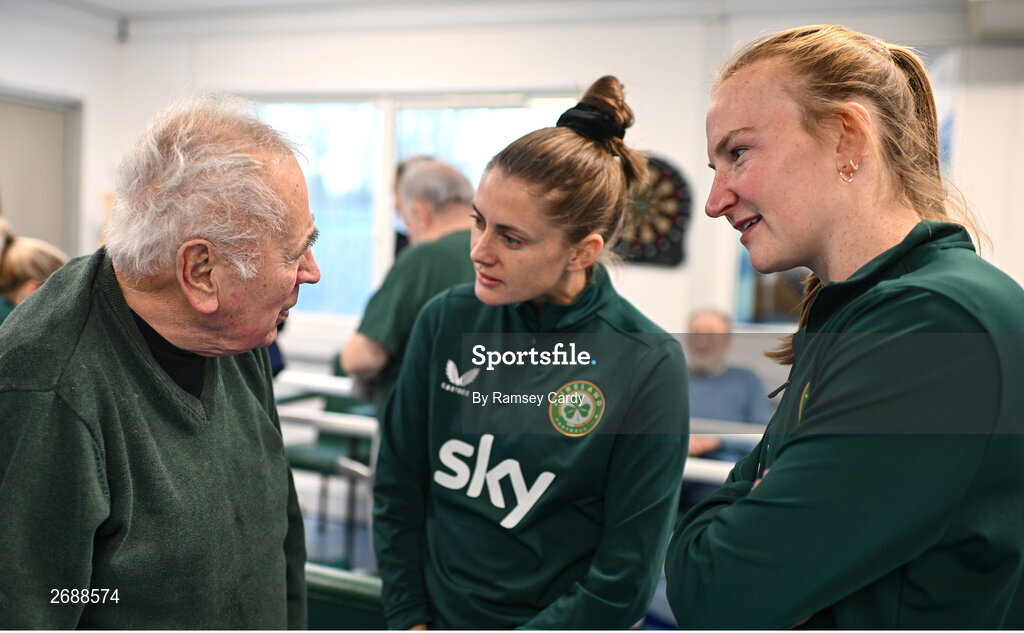 27 Novmeber 2023; Republic of Ireland players Sinead Farrelly, centre, and Courtney Brosnan with Eddie Neville during a visit to Cappagh Kids and The National Orthopaedic Hospital Cappagh in Dublin to launch the Cappagh Hospital Foundation Christmas Appeal and their fundraising ambassador Boney Maloney. Photo by Ramsey Cardy/Sportsfile