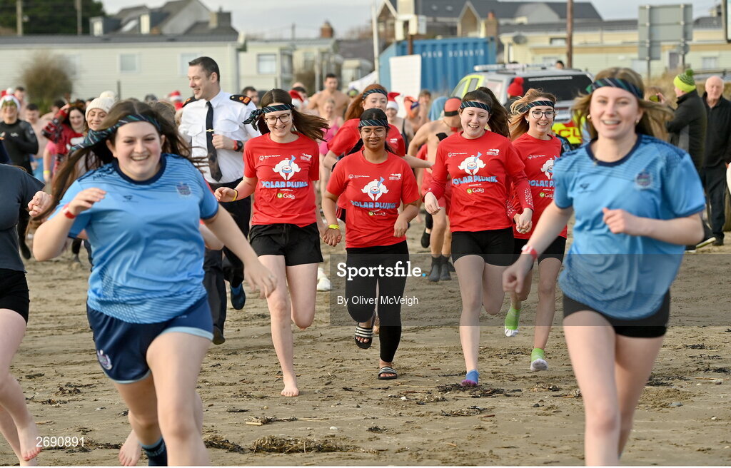 2 December 2023; Participants during The Clogherhead Polar Plunge which saw participants get “Freezin’ for a Reason” to raise funds for Special Olympics Ireland athletes in an event sponsored by Gala Retail at Clogherhead Beach in Louth. Photo by Oliver McVeigh/Sportsfile