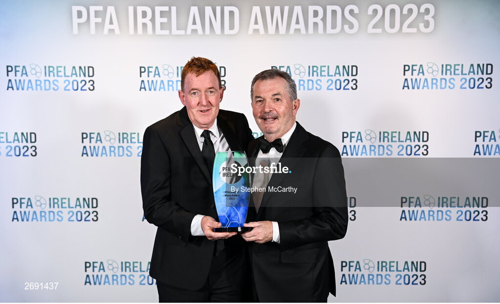 2 December 2023; Professor Stephen Eustace with the PFA Ireland Merit award and Dr Alan Byrne during the PFA Ireland Awards 2023 at Anantara The Marker Dublin Hotel in Dublin. Photo by Stephen McCarthy/Sportsfile
