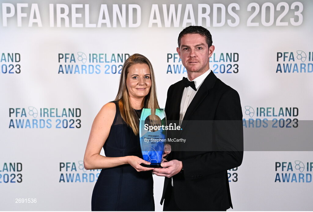 2 December 2023; Barry and Sarah Ferguson accept the PFA Ireland Irish Overseas Men's Player of the Year award on behalf of their son Evan Ferguson during the PFA Ireland Awards 2023 at Anantara The Marker Dublin Hotel in Dublin. Photo by Stephen McCarthy/Sportsfile