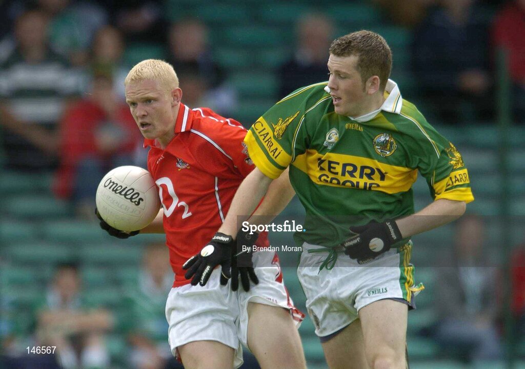 11 July 2004; Sean Dempsey, Cork, in action against Luke Quinn, Kerry. Munster Minor Football Championship Final, Cork v Kerry, Gaelic Grounds, Limerick. Picture credit; Brendan Moran / SPORTSFILE
