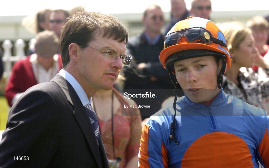 26 June 2004; Trainer Aidan O'Brien with jockey Jamie Spencer after the Netjets (2yo) Maiden. Curragh Racecourse, Co. Kildare. Picture credit; Matt Browne / SPORTSFILE