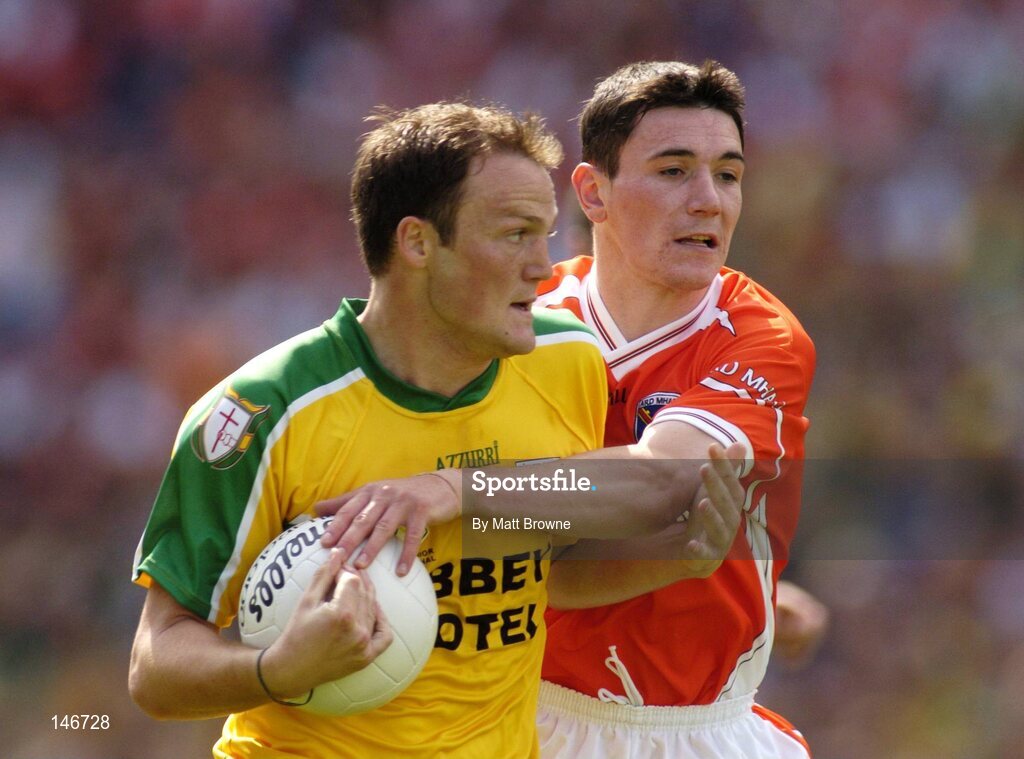 11 July 2004; Adrian Sweeney, Donegal, is tackled by Andy Mallon, Armagh. Bank of Ireland Ulster Senior Football Championship Final, Armagh v Donegal, Croke Park, Dublin. Picture credit; Matt Browne / SPORTSFILE