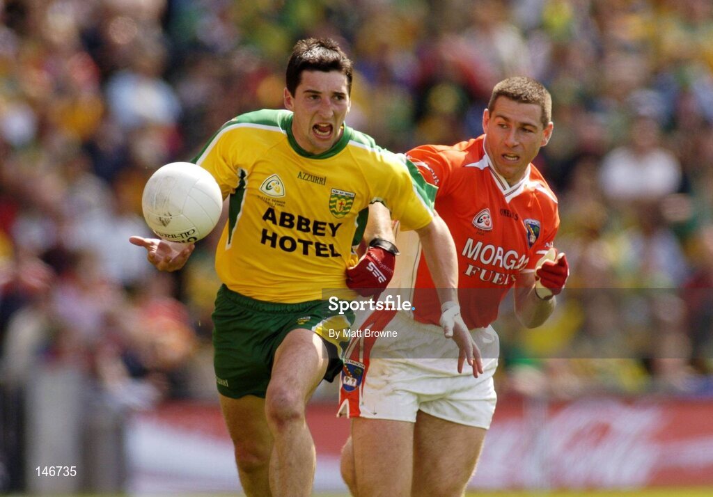 11 July 2004; Michael Hegarty, Donegal, is tackled by Diarmuid Marsden, Armagh. Bank of Ireland Ulster Senior Football Championship Final, Armagh v Donegal, Croke Park, Dublin. Picture credit; Matt Browne / SPORTSFILE
