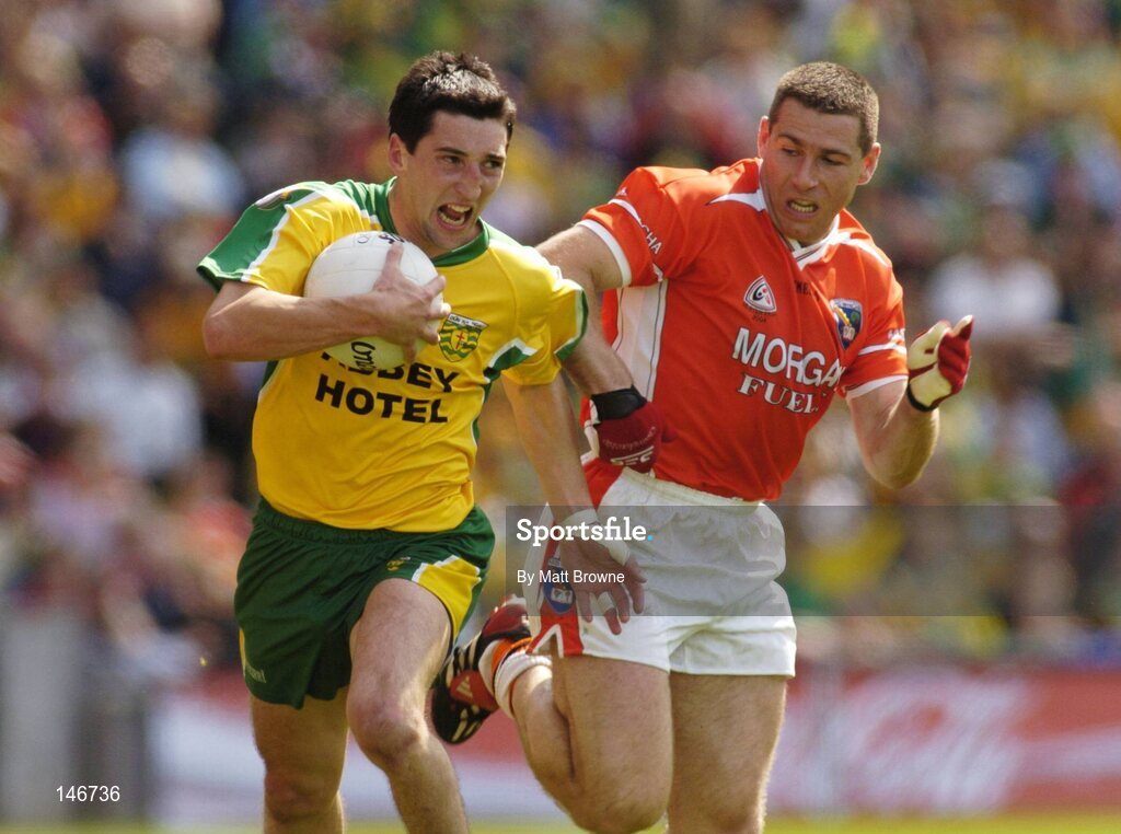 11 July 2004; Michael Hegarty, Donegal, is tackled by Diarmuid Marsden, Armagh. Bank of Ireland Ulster Senior Football Championship Final, Armagh v Donegal, Croke Park, Dublin. Picture credit; Matt Browne / SPORTSFILE