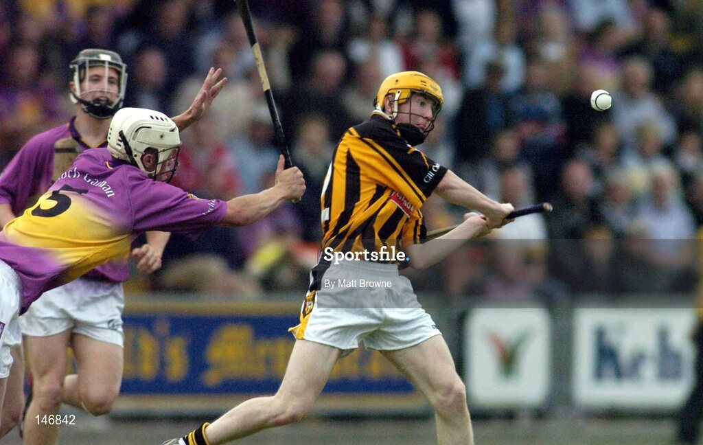14 July 2004; James Fitzpatrick, Kilkenny, in action against Kevin Kavanagh, Wexford. Erin Leinster Under 21 Hurling Final, Wexford v Kilkenny, Wexford Park, Wexford. Picture credit; Matt Browne / SPORTSFILE