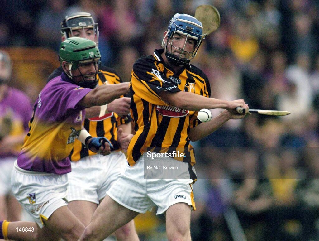 14 July 2004; Brian Dowling, Kilkenny, in action against Keith Rossiter, Wexford. Erin Leinster Under 21 Hurling Final, Wexford v Kilkenny, Wexford Park, Wexford. Picture credit; Matt Browne / SPORTSFILE