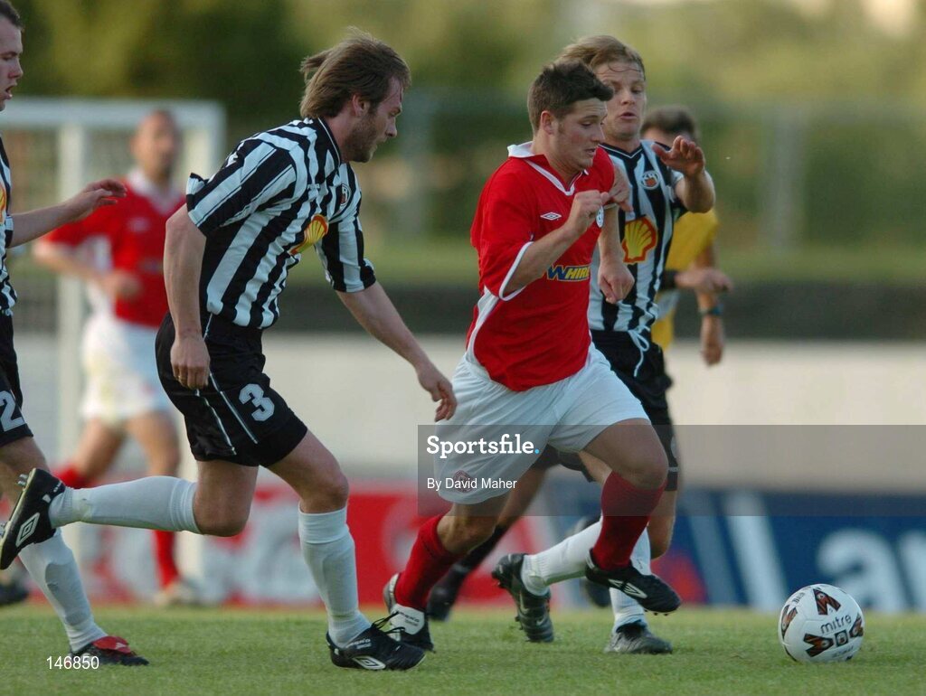 14 July 2004; Wesley Hollahan, Shelbourne, in action against Bjarni Porsteinsson, left, and Agust Por Gylfason, KR Reykjavik. Champions League, Qualifying Round, KR Reykjavik v Shelbourne, KR stadium, Reykjavik, Iceland. Picture credit; David Maher / SPORTSFILE