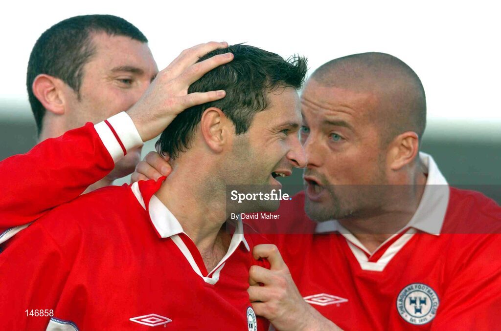 14 July 2004; Alan Moore, centre, Shelbourne, celebrates after scoring his sides first goal with team-mate Jason Byrne and Dave Rogers. Champions League, Qualifying Round, KR Reykjavik v Shelbourne, KR stadium, Reykjavik, Iceland. Picture credit; David Maher / SPORTSFILE