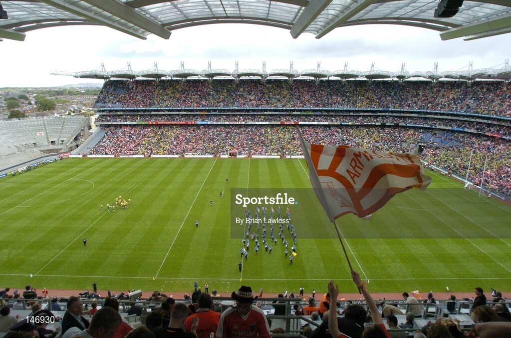 11 July 2004; An Armagh fan waves a flag as the National Anthem finishes. Bank of Ireland Ulster Senior Football Championship Final, Armagh v Donegal, Croke Park, Dublin. Picture credit; Brian Lawless / SPORTSFILE