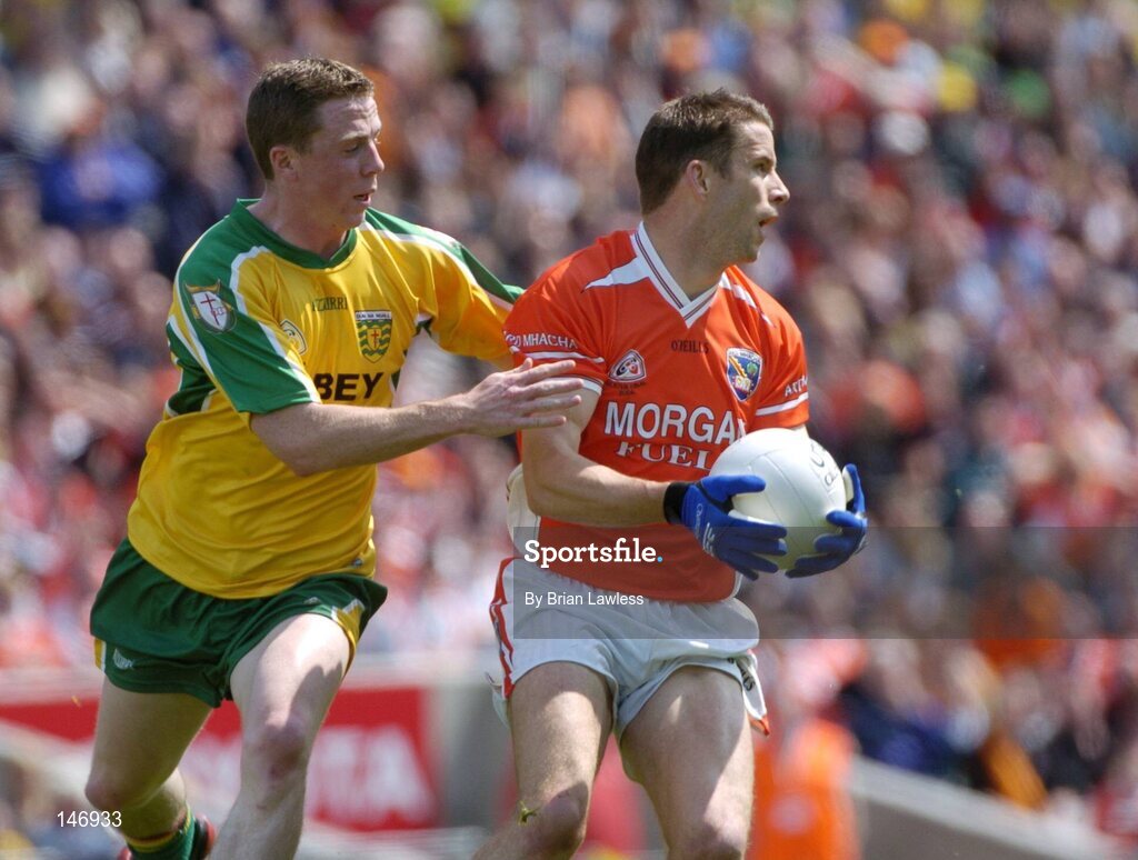 11 July 2004; Paul McGrane, Armagh, in action against Stephen McDermott, Donegal. Bank of Ireland Ulster Senior Football Championship Final, Armagh v Donegal, Croke Park, Dublin. Picture credit; Brian Lawless / SPORTSFILE