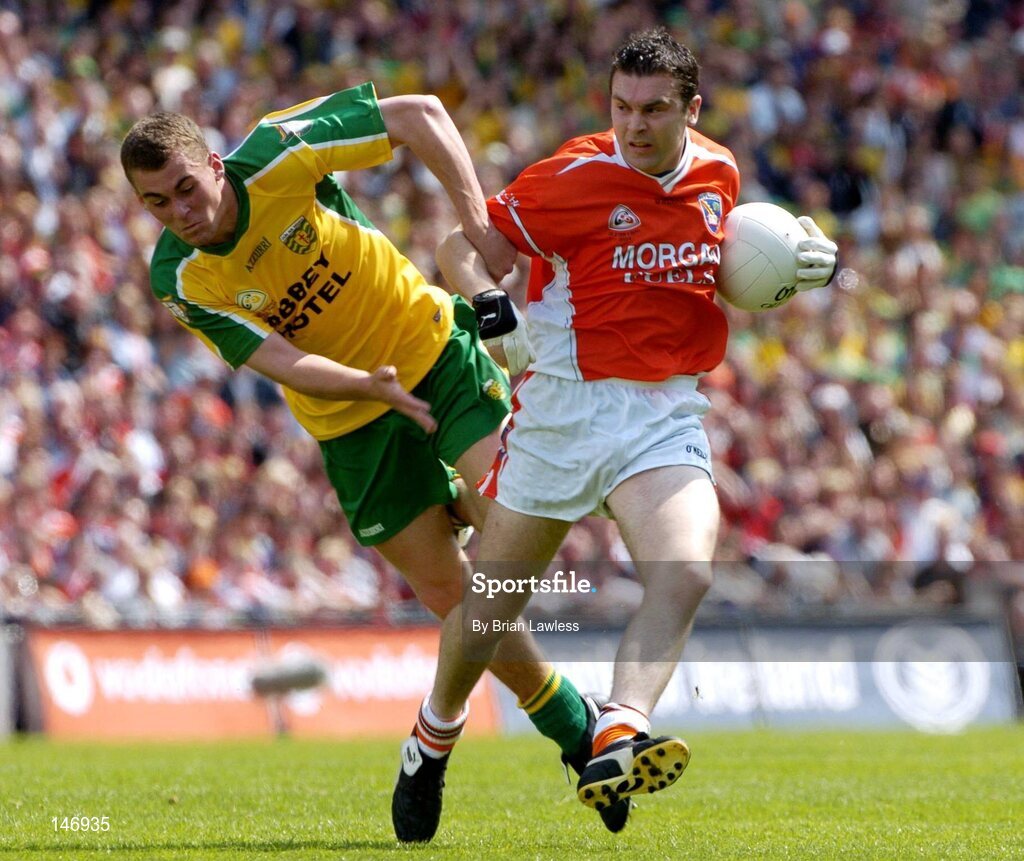11 July 2004; Oisin McConville, Armagh, in action against Eamon McGee, Donegal. Bank of Ireland Ulster Senior Football Championship Final, Armagh v Donegal, Croke Park, Dublin. Picture credit; Brian Lawless / SPORTSFILE