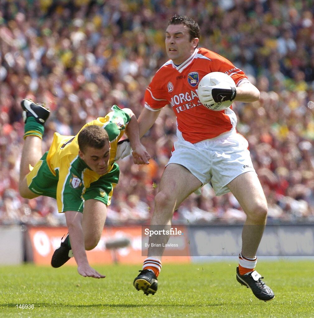 11 July 2004; Oisin McConville, Armagh, in action against Eamon McGee, Donegal. Bank of Ireland Ulster Senior Football Championship Final, Armagh v Donegal, Croke Park, Dublin. Picture credit; Brian Lawless / SPORTSFILE
