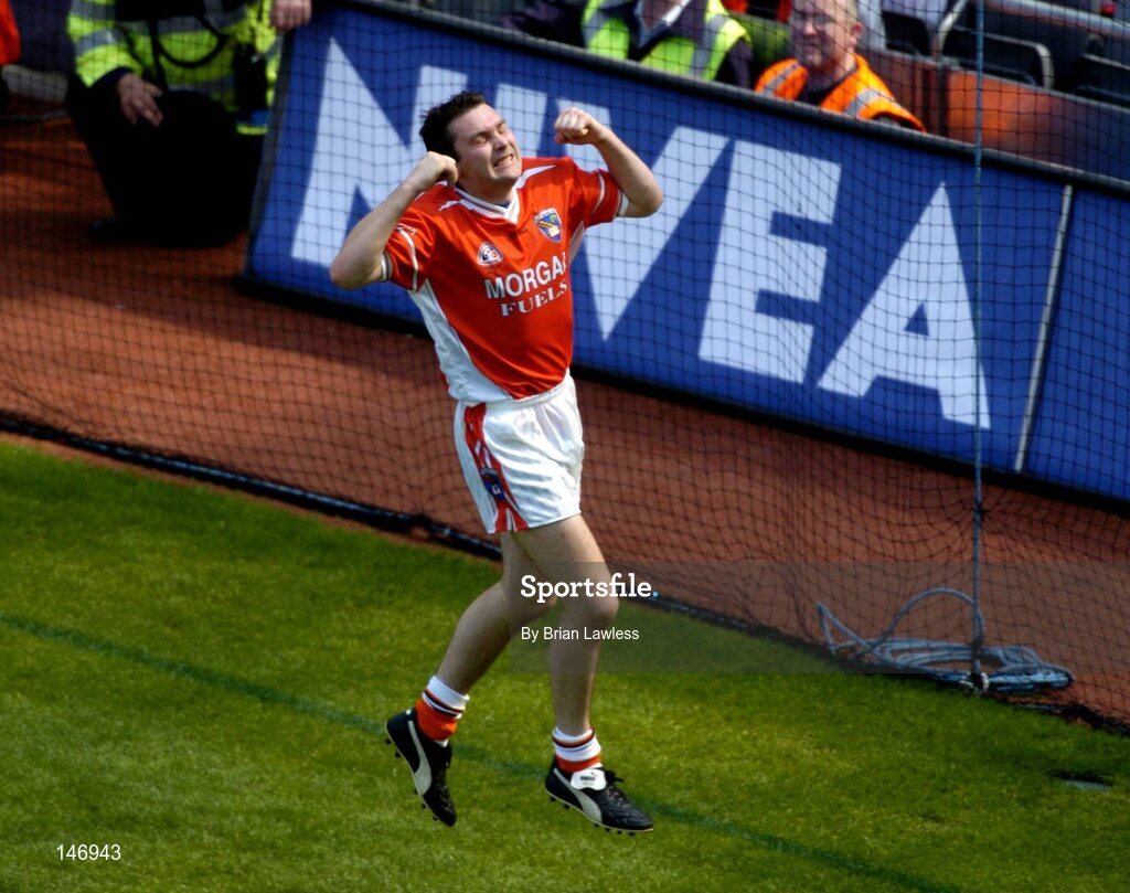 11 July 2004; Armagh's Oisin McConville celebrates after scoring his sides third goal. Bank of Ireland Ulster Senior Football Championship Final, Armagh v Donegal, Croke Park, Dublin. Picture credit; Brian Lawless / SPORTSFILE