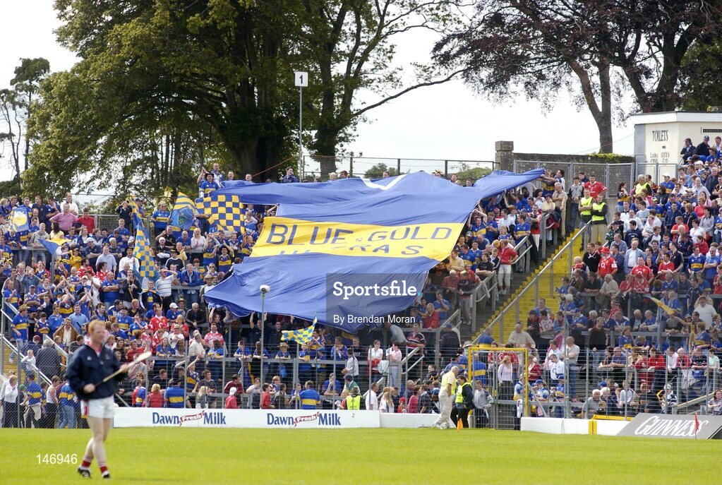 10 July 2004; Tipperary fans unveil a large banner in the shape of a jersey before the game. Guinness Senior Hurling Championship Qualifier, Round 3, Cork v Tipperary, Fitzgerald Stadium, Killarney, Co. Kerry. Picture credit; Brendan Moran / SPORTSFILE