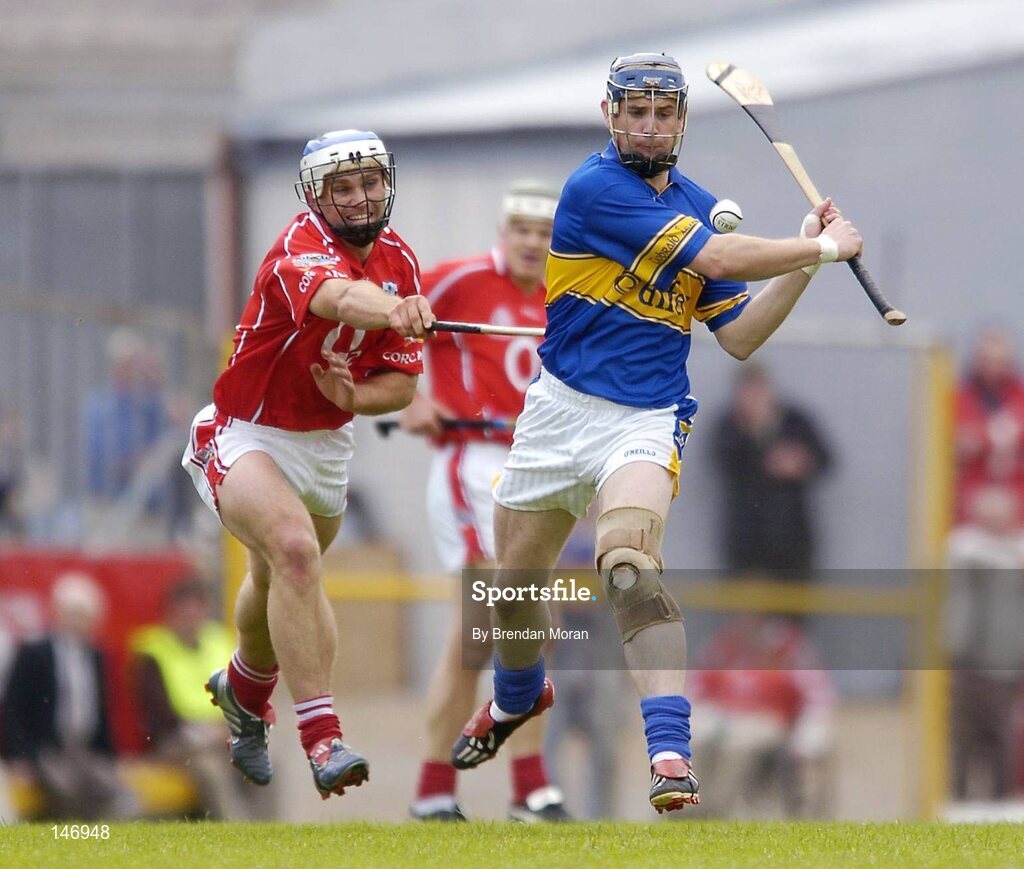 10 July 2004; Martin Maher, Tipperary, in action against Garvan McCarthy, Cork. Guinness Senior Hurling Championship Qualifier, Round 3, Cork v Tipperary, Fitzgerald Stadium, Killarney, Co. Kerry. Picture credit; Brendan Moran / SPORTSFILE