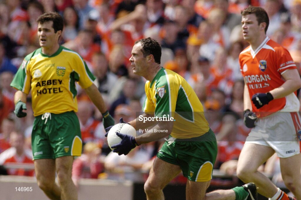 11 July 2004; Damien Diver, Donegal, takes possession ahead of Armagh's Ronan Clarke and team-mate Nial McCready. Bank of Ireland Ulster Senior Football Championship Final, Armagh v Donegal, Croke Park, Dublin. Picture credit; Matt Browne / SPORTSFILE