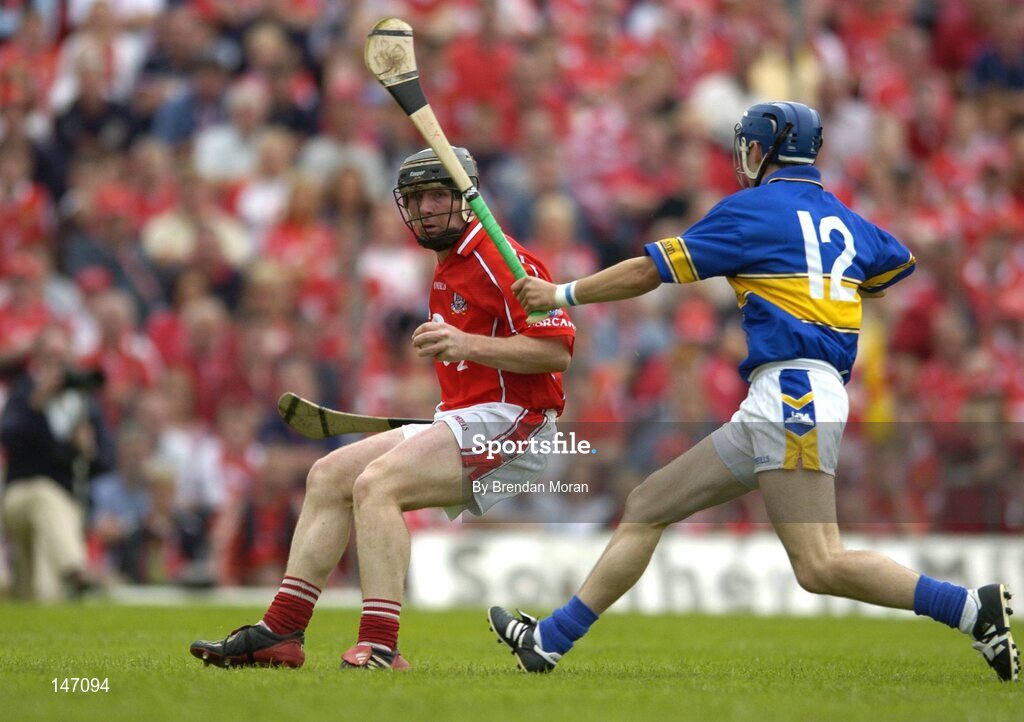 10 July 2004; Wayne Sherlock, Cork, in action against Benny Dunne, Tipperary. Guinness Senior Hurling Championship Qualifier, Round 3, Cork v Tipperary, Fitzgerald Stadium, Killarney, Co. Kerry. Picture credit; Brendan Moran / SPORTSFILE