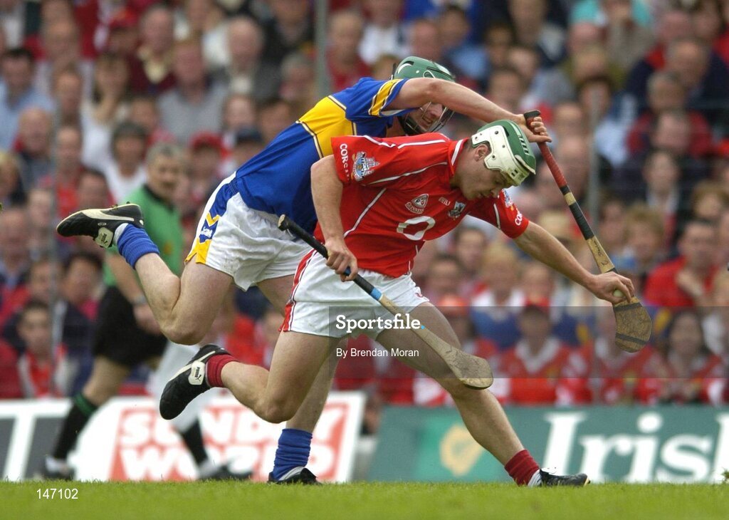 10 July 2004; Niall McCarthy, Cork, in action against Declan Fanning, Tipperary. Guinness Senior Hurling Championship Qualifier, Round 3, Cork v Tipperary, Fitzgerald Stadium, Killarney, Co. Kerry. Picture credit; Brendan Moran / SPORTSFILE