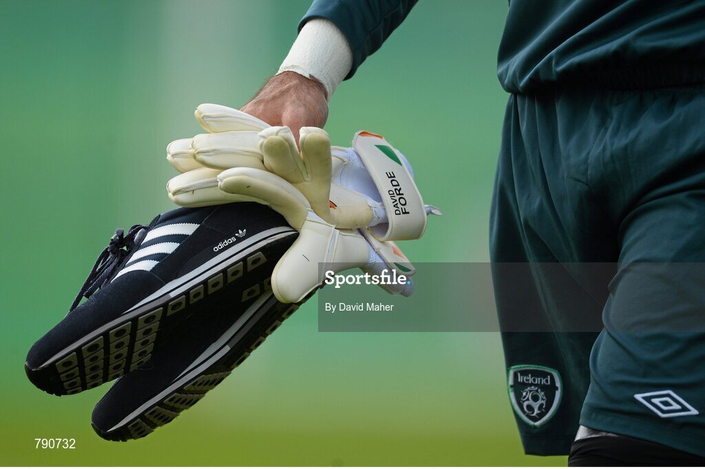 8 September 2013; General view of Republic of Ireland goalkeeper David Forde's gloves and shoes at the end of  squad training ahead of their 2014 FIFA World Cup Qualifier Group C game against Austria on Tuesday. Republic of Ireland Squad Training, Gannon Park, Malahide, Co. Dublin. Picture credit: David Maher / SPORTSFILE