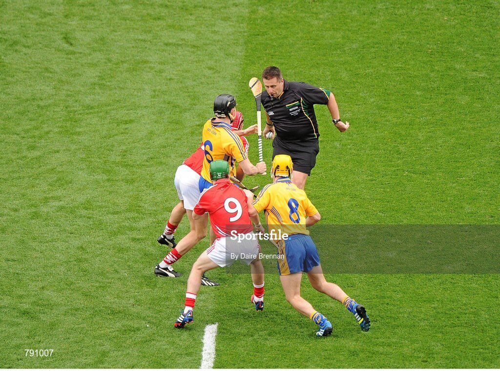 8 September 2013; Referee Brian Gavin throws in the ball to start the game between Patrick Donnellan, left, and Colm Galvin, Clare, and Lorcán McLoughlin, left, and Daniel Kearney, Cork. GAA Hurling All-Ireland Senior Championship Final, Cork v Clare, Croke Park, Dublin. Picture credit: Dáire Brennan / SPORTSFILE