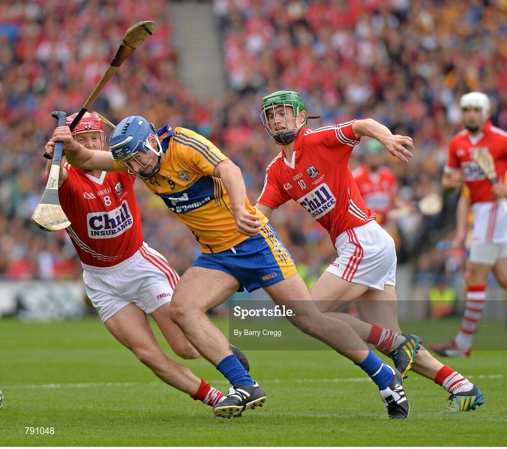 8 September 2013; Conor Ryan, Clare, in action against Lorcán McLoughlin, left, and Séamus Harnedy, Cork. GAA Hurling All-Ireland Senior Championship Final, Cork v Clare, Croke Park, Dublin. Picture credit: Barry Cregg / SPORTSFILE