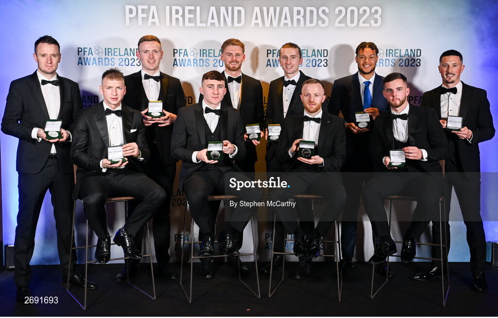 2 December 2023; The PFA Ireland Men’s First Division Team of the Year, from left, Brendan Clarke of Galway United, Stephen Walsh of Galway United, Killian Brouder, Edward McCarthy of Galway United, Rob Slevin of Galway United, David Hurley of Galway United, Jack Doherty of Cobh Ramblers, Giles Phillips of Waterford, Ryan Burke of Waterford and Ronan Coughlan of Waterford, during the PFA Ireland Awards 2023 at Anantara The Marker Dublin Hotel in Dublin. Photo by Stephen McCarthy/Sportsfile