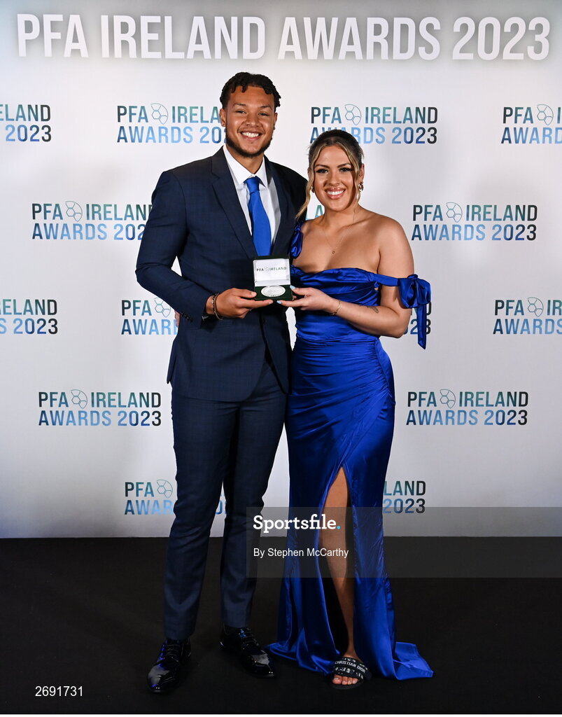 2 December 2023; Giles Phillips of Waterford with his PFA Ireland Men’s First Division Team of the Year medal and Nadia Auld during the PFA Ireland Awards 2023 at Anantara The Marker Dublin Hotel in Dublin. Photo by Stephen McCarthy/Sportsfile