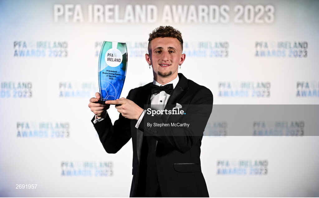 2 December 2023; Sam Curtis of St Patrick's Athletic with the PFA Ireland Men’s Young Player of the Year award during the PFA Ireland Awards 2023 at Anantara The Marker Dublin Hotel in Dublin. Photo by Stephen McCarthy/Sportsfile