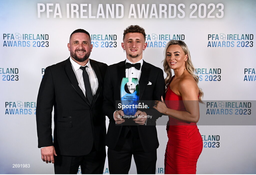 2 December 2023; Winner of the PFA Ireland Men’s Young Player of the Year award Sam Curtis of St Patrick's Athletic, with his parents Darren and Lisa, during the PFA Ireland Awards 2023 at Anantara The Marker Dublin Hotel in Dublin. Photo by Stephen McCarthy/Sportsfile
