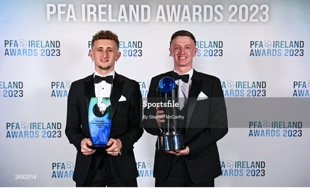 2 December 2023; PFA Ireland Men’s Young Player of the Year Sam Curtis of St Patrick's Athletic, left, and PFA Ireland Men’s Player of the Year winner Chris Forrester of St Patrick's Athletic during the PFA Ireland Awards 2023 at Anantara The Marker Dublin Hotel in Dublin. Photo by Stephen McCarthy/Sportsfile