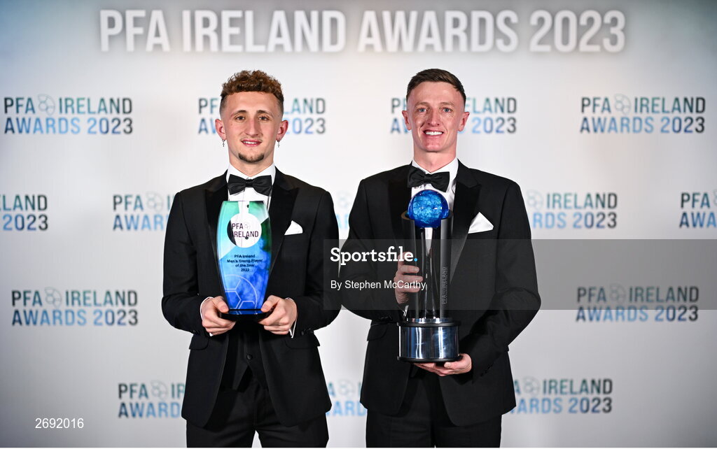 2 December 2023; PFA Ireland Men’s Young Player of the Year Sam Curtis of St Patrick's Athletic, left, and PFA Ireland Men’s Player of the Year winner Chris Forrester of St Patrick's Athletic during the PFA Ireland Awards 2023 at Anantara The Marker Dublin Hotel in Dublin. Photo by Stephen McCarthy/Sportsfile
