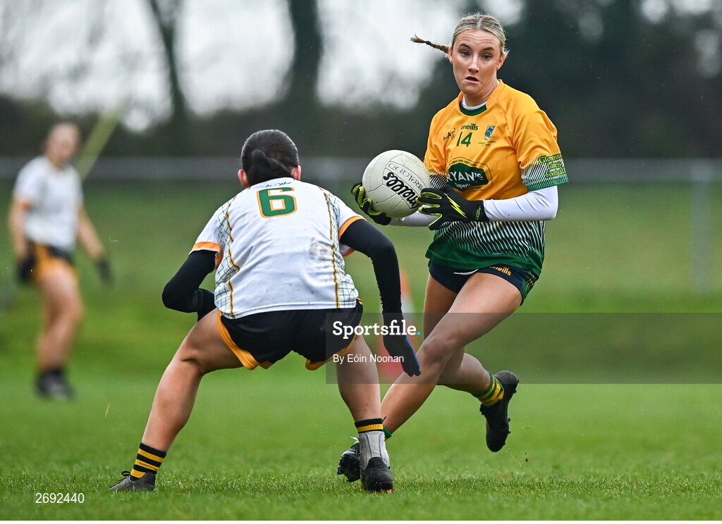 3 December 2023; Orlaith Roche of Glanmire in action against Emma Regan of Na Fianna during the Currentaccount.ie LGFA All-Ireland Intermediate Club Championship semi-final match between Glanmire, Cork, and Na Fianna, Meath, at Mallow GAA Grounds in Mallow, Cork. Photo by Eóin Noonan/Sportsfile