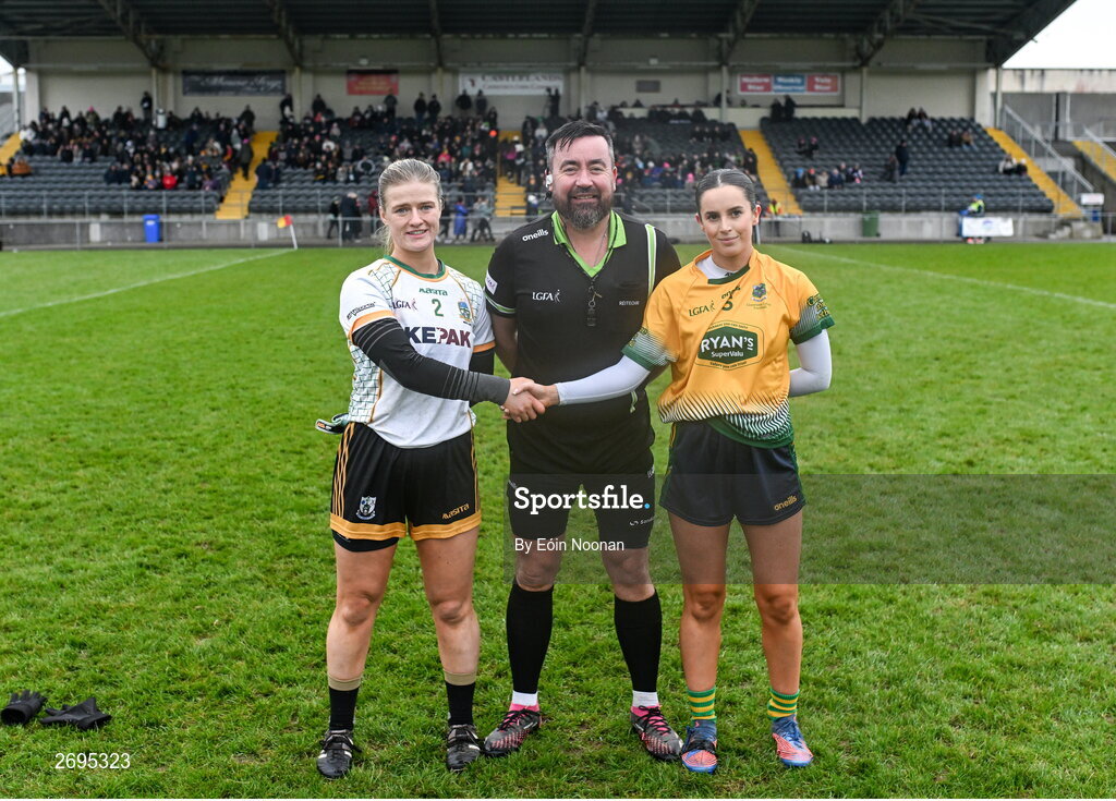 3 December 2023; Referee Seamus Mulvihill with Aedin Slattery of Na Fianna and Ellen Twomey of Glanmire during the Currentaccount.ie LGFA All-Ireland Intermediate Club Championship semi-final match between Glanmire, Cork, and Na Fianna, Meath, at Mallow GAA Grounds in Mallow, Cork. Photo by Eóin Noonan/Sportsfile