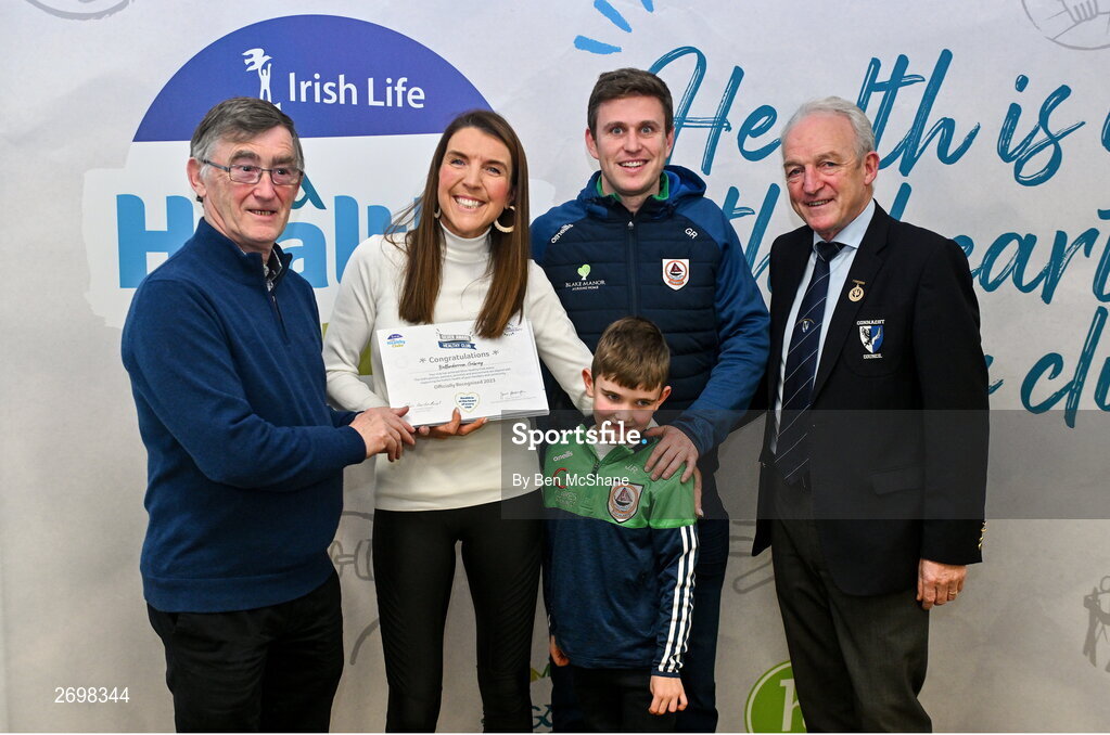 14 December 2023; Ballinderreene, Galway, representatives Claire Walsh and Gary Reinford is presented their Silver Healthy Club award by Connacht GAA secretary John Prenty, left, and Connacht GAA Council president John Murphy, right, during the Irish Life Connacht GAA Healthy Clubs recognition event at the Connacht GAA Centre of Excellence in Bekan, Mayo. Photo by Ben McShane/Sportsfile